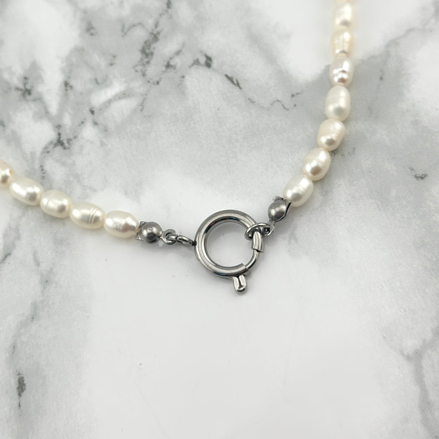 Pearl necklace with a silver clasp