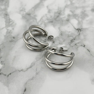 Silver triple hoops